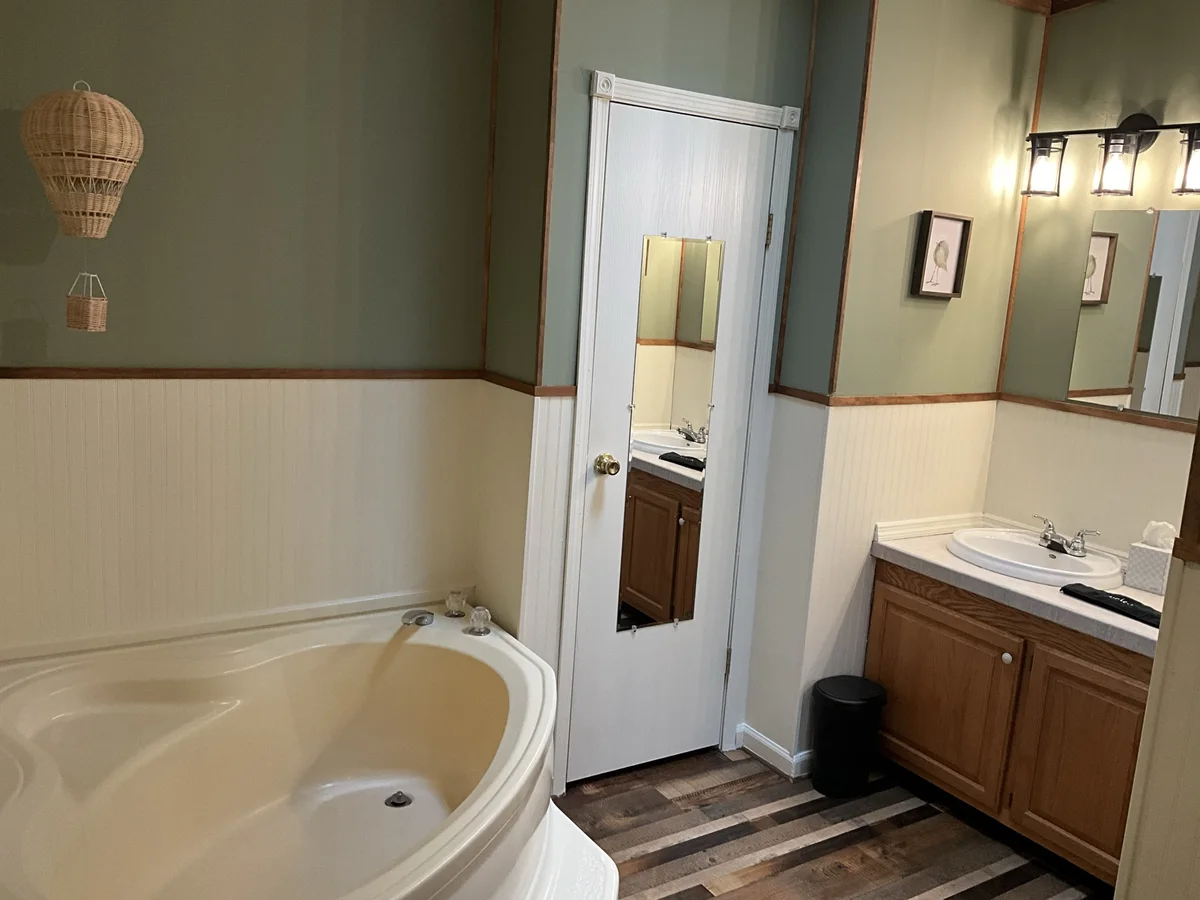 Bathroom at The Auburn with vanity and shower access